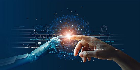 Human finger touches robot finger, bright light where they touch